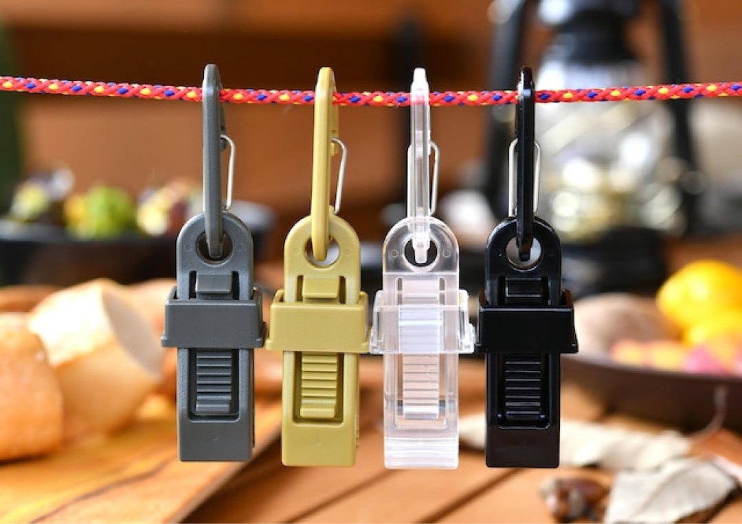 Four OBORO carabiner clips hanging from a camp line