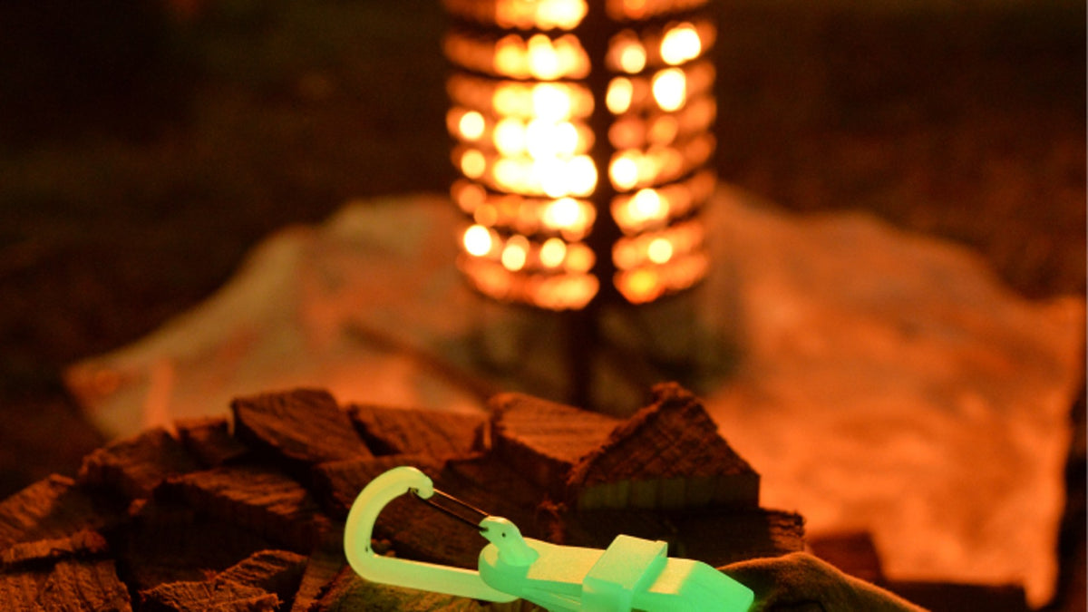 Glowing clip beside a campfire